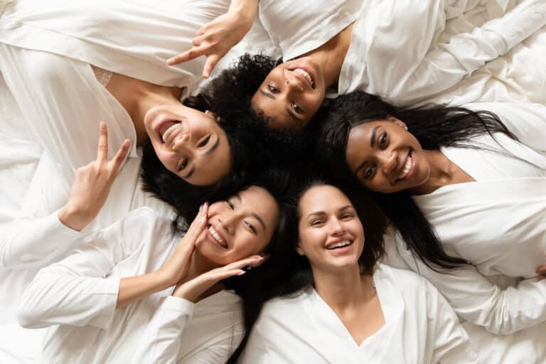 Top,View,Five,Diverse,Women,In,White,Bathrobes,Lying,In